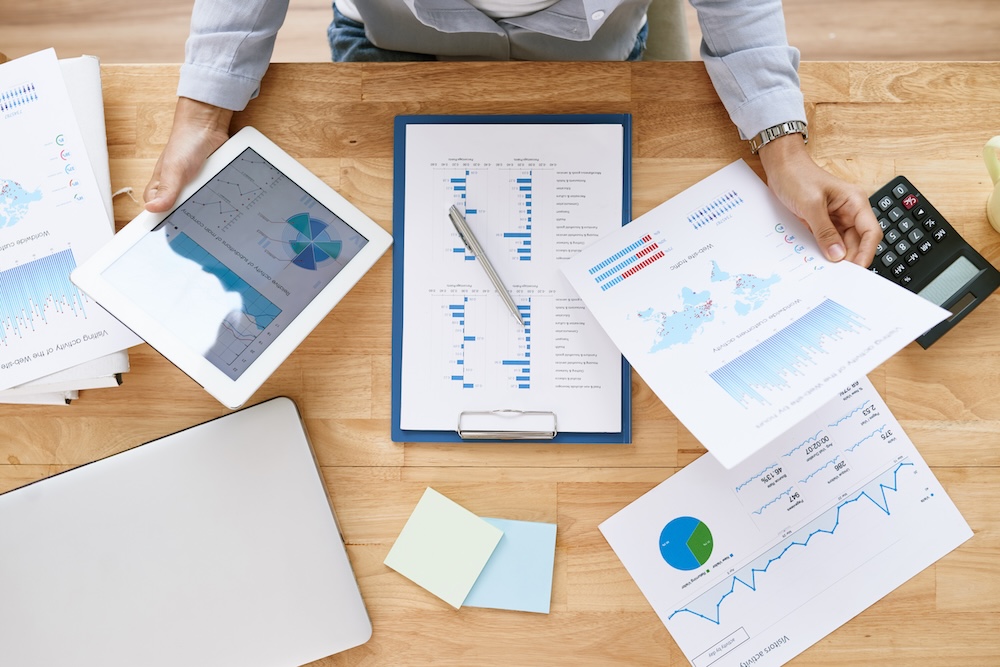 a person going over bookkeeping paper work